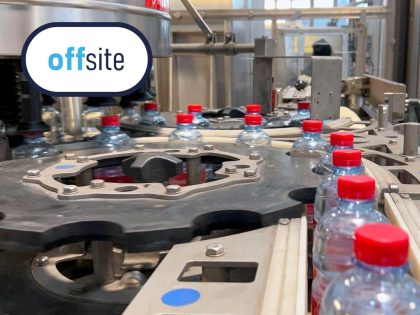 KRONES Contiroll labeling machine used for 13,000 bph, 500 ml format. OPP label with hot melt adhesive, format changeover and Siemens PLC for precise control.