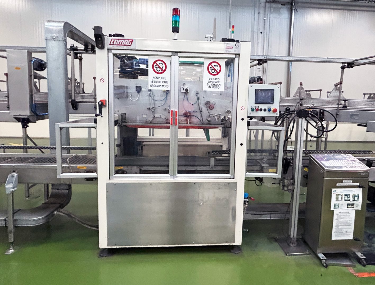 COMAG H65/1 handle applicator (1999), with automatic reel change, Omron PLC and HMI. Available for viewing and approval or reconditioned with compatible spare parts. 