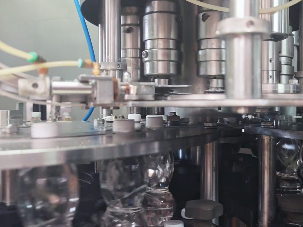 PET bottling line for still and sparkling water, up to 13,000 bottles/hour. Complete with SIPA blow molding machine, AROL filler and capper.